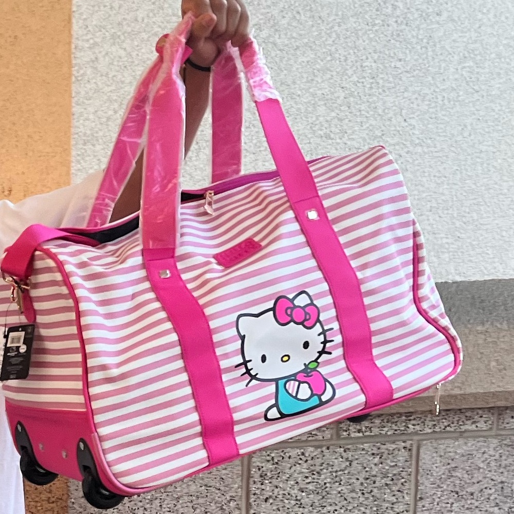Bioworld x Sanrio Hello Kitty Pink and White Carry On Bag With Wheels!